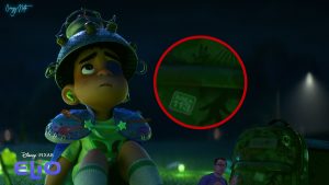 A113 hidden on Elio's backpack next to a Sasquatch patch
